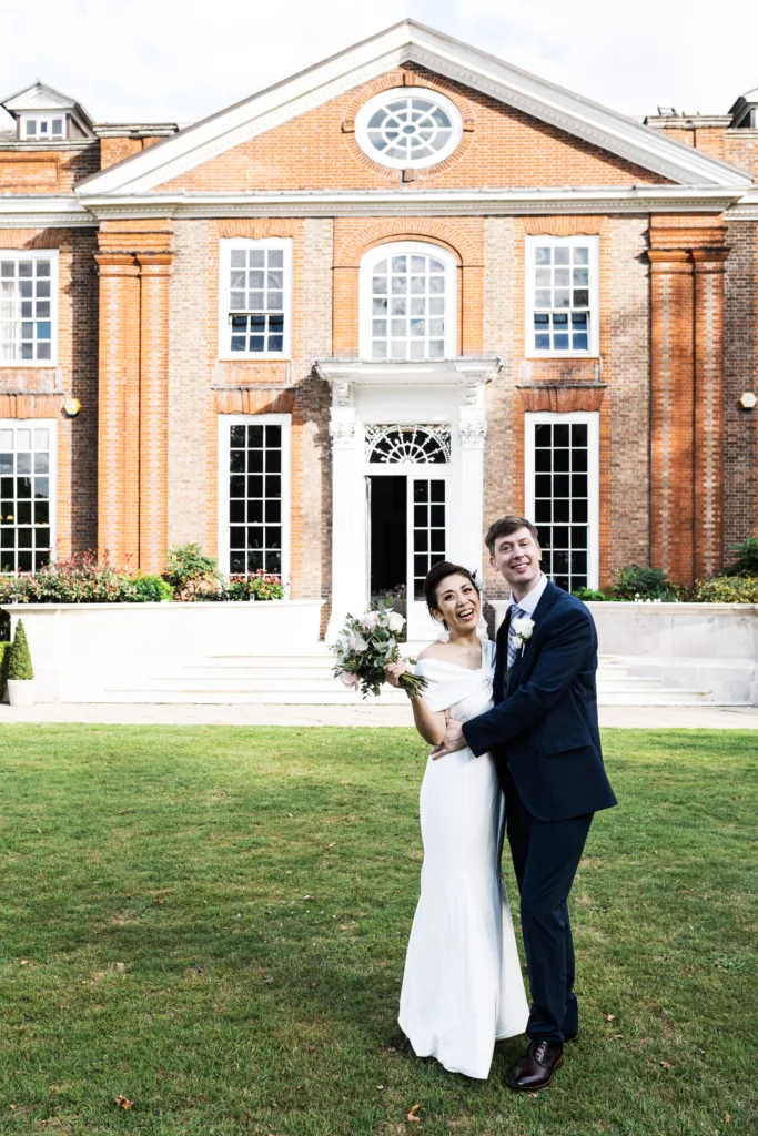 outdoor shot of bride and groom wedding photography for kent wedding at brabourne house 